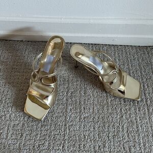 Gold designer looking heels